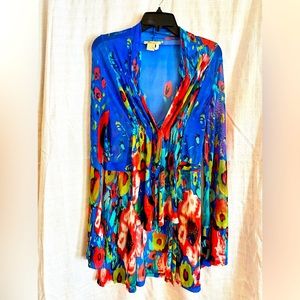 A sheer top, jacket, cover-up